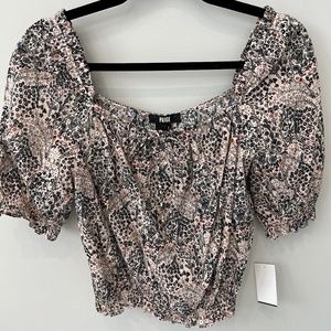 Paige Elise top in size XS. New with tags.